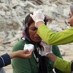 Woman receives medical attention after Iran Bushehr Earthquake 2013 / Mohammad Fatemi / EPA